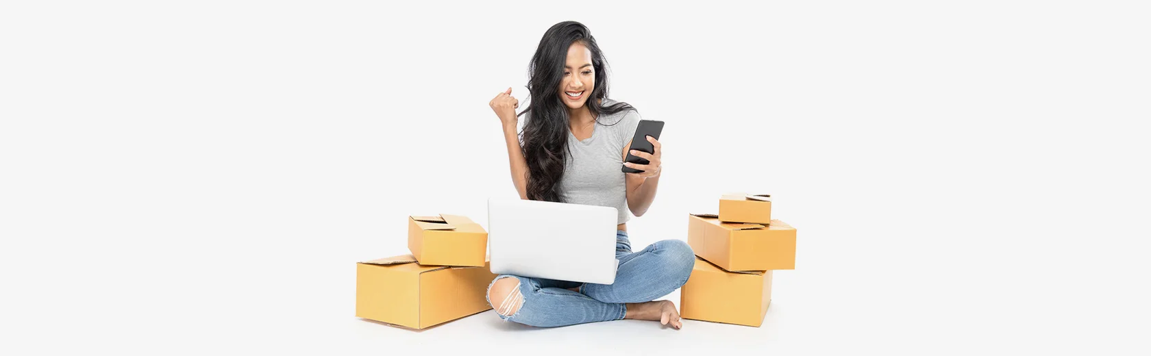 Woman celebrating with parcels