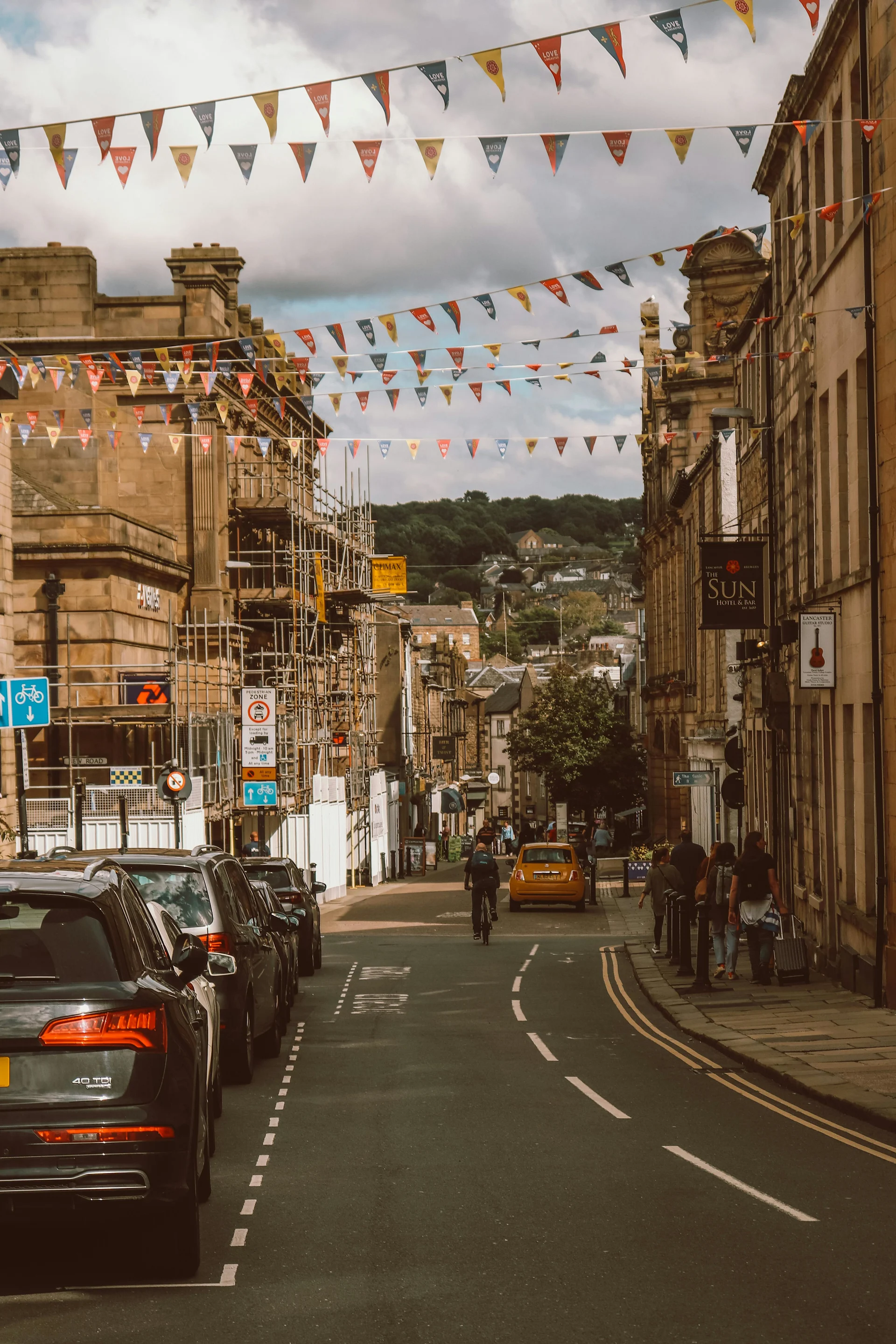 Lancaster high street with bunting and cars