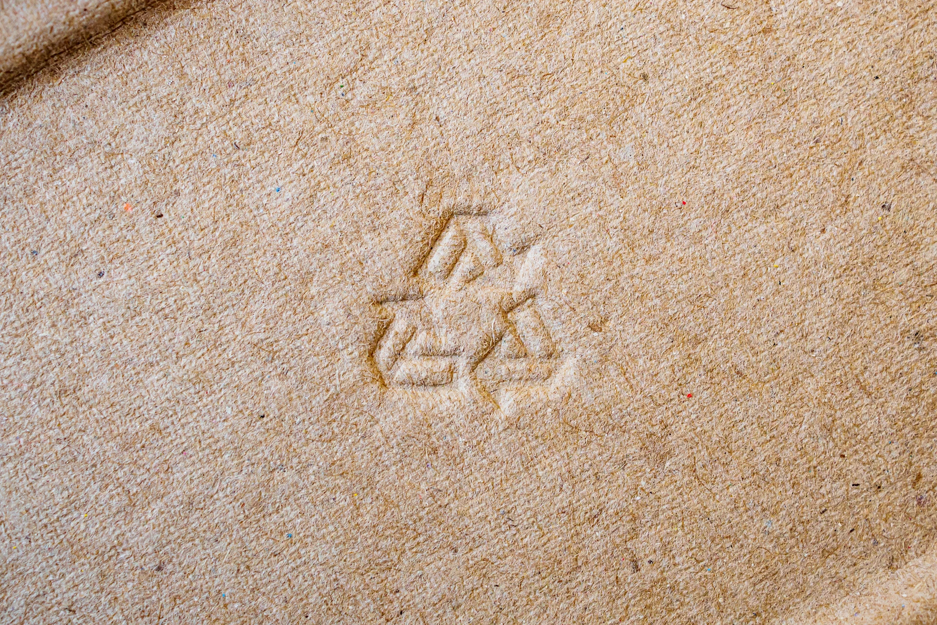 Image of cardboard box with recycling logos
