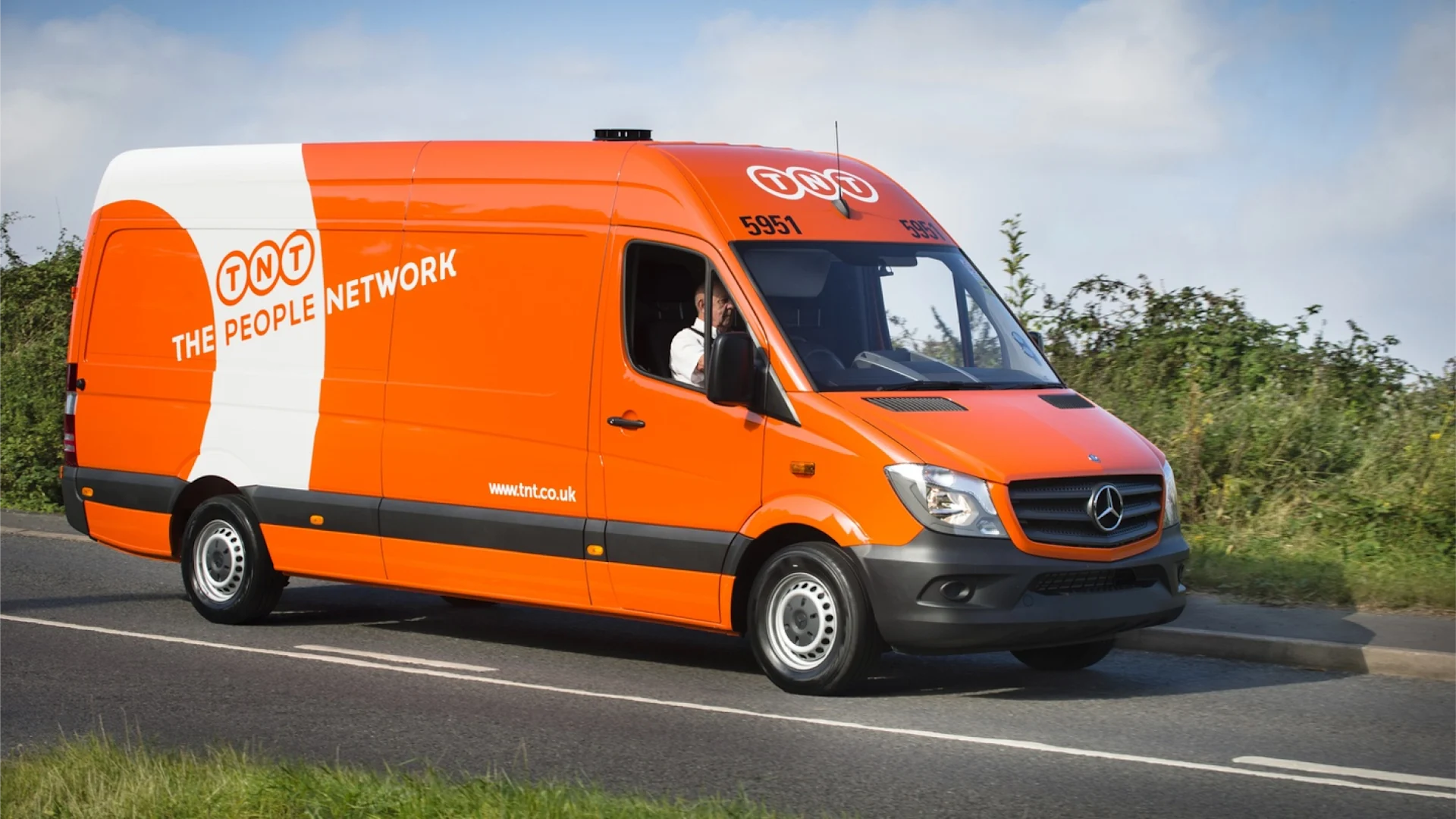 One TNT Van on road