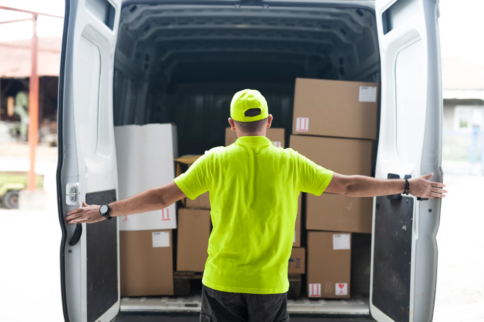 Man looking into a Yodel van